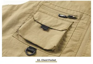 Detail of khaki outdoor vest showing functional chest pockets and a black D-ring hook