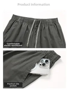 Détail du short en coton gris avec taille élastique à cordon et poches latérales