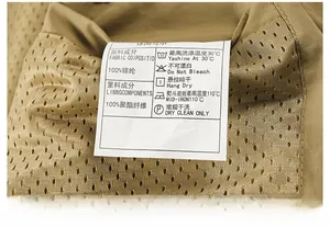 Close-up of vest mesh lining and laundry care label showing 100% nylon fabric details
