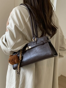 Vintage dark brown faux leather shoulder bag with gold twist lock and cute bear charm