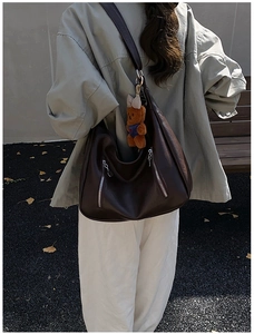 Dark brown large capacity PU leather hobo bag with teddy bear charm on shoulder