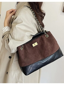 Quilted leather and suede tote bag with gold chain strap and turn-lock closure
