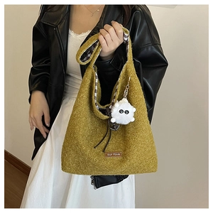 Fashionable mustard yellow wool tote bag with soft plush ball and plaid lining details