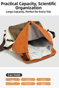 Detail showing high-capacity interior of a color-block travel backpack with drawstring