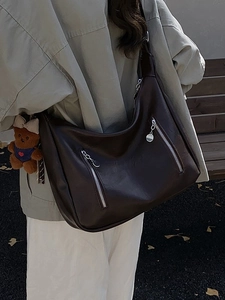 Maillard vintage dark brown leather tote bag with bear charm and front zipper detail