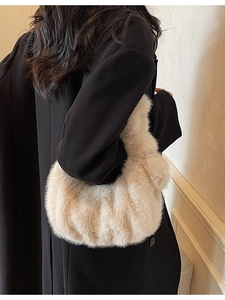 Elegante borsa a mano in peluche beige con manico a nodo in stile minimalista