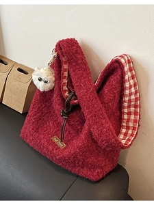 Deep red fuzzy wool tote bag with soft faux fur texture and leather logo patch