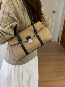 French retro beige suede shoulder bag with black leather straps and metal buckle
