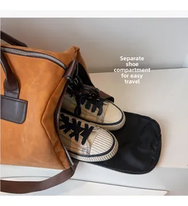 Detail showing side shoe compartment of the brown travel duffel bag with sneakers inside