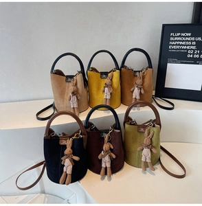 Collection of frosted bucket bags in six colors with cute bunny charms and DM logo
