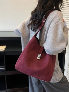 Burgundy suede bucket bag for women with minimalist shoulder strap and silver buckle