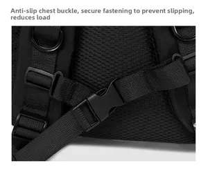Close-up of adjustable chest buckle and breathable mesh shoulder straps on the black backpack