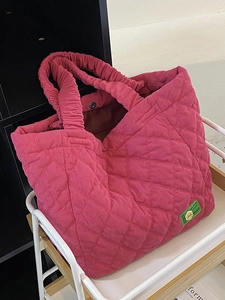 Pink quilted corduroy tote bag with large capacity and stylish ruched handle design