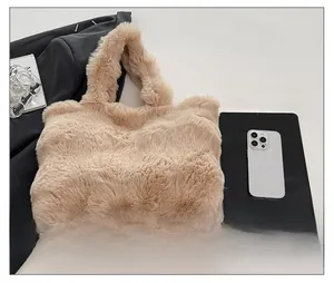 Detailed top view of large capacity faux rabbit fur tote bag in light camel color
