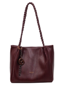 Retro burgundy woven tote bag with twisted straps and knot charm on white background