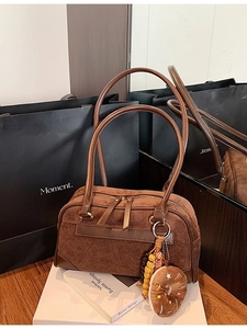 Brown vintage frosted suede tote bag with cute donut pendant and gold hardware details