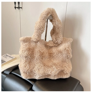 Detail of soft high-density faux fur tote bag in milk tea color for autumn and winter