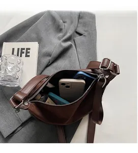 Internal view of the brown crescent saddle bag showing large capacity for essentials