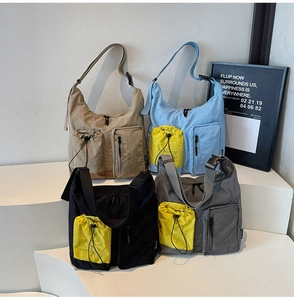 Borse a tracolla in nylon kaki, blu, nero e grigio con tasche funzionali con coulisse