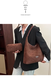 Macro detail of dark brown suede tote and matching pouch set with premium texture