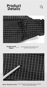 Detail von wasserfestem Karogewebe und Doppelreißverschluss an leichter Brusttasche