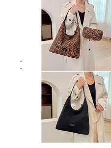 Detail showing leopard print and black suede tote bags with matching small zipper pouch
