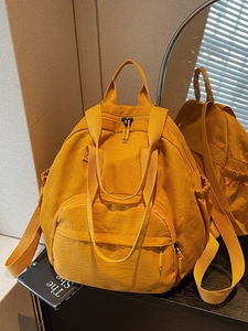 Bright yellow versatile tote backpack with large capacity for school and daily commuting