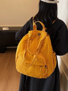 Minimalist yellow nylon tote backpack with large capacity for commuting and students