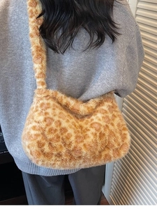 Plush leopard print tote bag for women shown as a stylish shoulder underarm bag