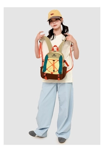 Outdoor hiking backpack with vibrant yellow, blue, and brown panels and orange straps