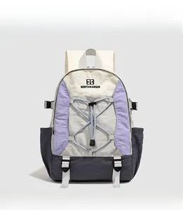 Detailed front view of the outdoor backpack featuring purple and cream color-blocking
