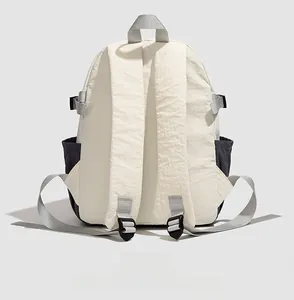 Detailed back view of outdoor backpack showing ergonomic straps and contrast side pockets