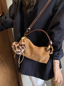 Vintage brown suede pillow handbag for women with leopard heart charm and metal handle