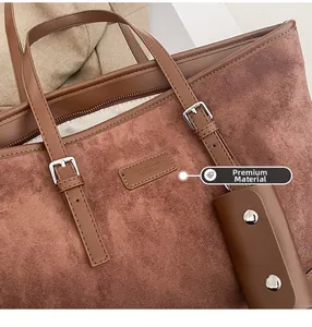 Close-up of premium leopard tote bag fabric with leather brand tag and metal buckle