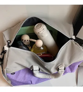 Macro shot showing large storage capacity for bottles and essentials in a travel bag