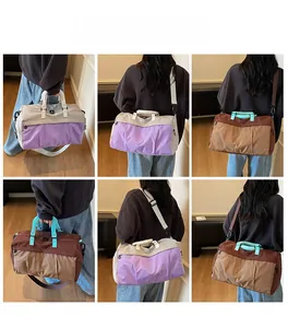 Detail showing high-capacity waterproof travel bags with adjustable shoulder straps