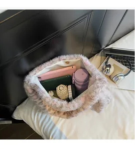 Macro detail of spacious faux fur tote interior showing soft lining and magnetic closure