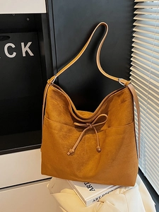 Vintage caramel brown suede tote bag with decorative bow and large capacity for women