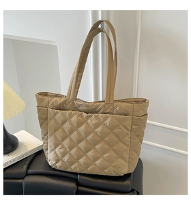Quilted nylon tote bag in light khaki finish with spacious interior and soft diamond padding
