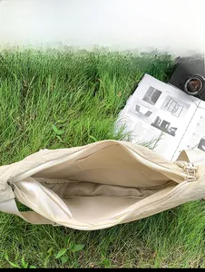 Internal capacity display of the tote bag with multiple pockets and khaki nylon lining