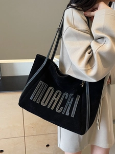 Large capacity black suede tote bag with white contrast stitching and letter detail