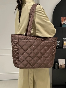Brown quilted nylon tote bag with large capacity and classic diamond stitching detail