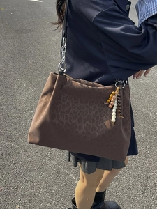 Brown leopard print suede tote bag with metal chain strap and retro bead tassel charm