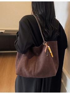 Large dark coffee suede tote bag with stylish beaded tassel and minimalist shoulder straps