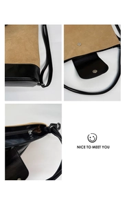 Close-up of brown suede and black leather stitching with magnetic buckle and metal zipper