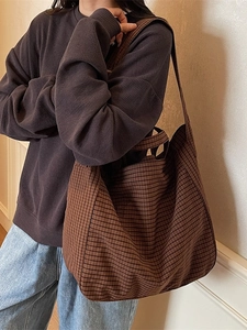 Large brown checkered canvas tote bag with shoulder strap for daily commuting