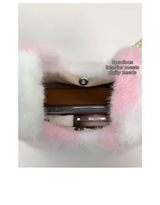Interior view of plush fuzzy tote bag showing daily essentials and magnetic closure