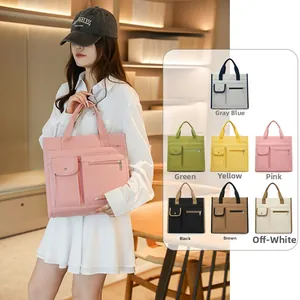 Detail of canvas tote bag featuring large capacity and seven different color options