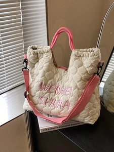 Quilted tote bag in off-white with pink handles and detachable crossbody strap