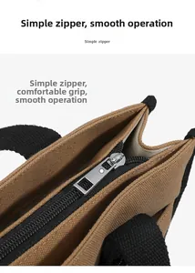 Detail view of smooth metal zipper and durable canvas texture on a brown tote bag